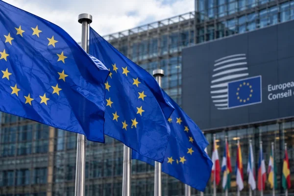 European Union flags outside the European Council building in Brussels