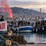 Illustration of French fishing boats blockading a Mediterranean port during protests over rising fuel costs.