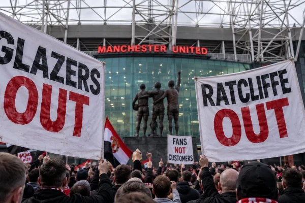 Manchester United supporters protesting outside Old Trafford against the Glazers and Sir Jim Ratcliffe