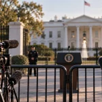 Editorial illustration of television cameras and microphones behind barriers outside the White House, representing restrictions on media access.