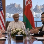 Illustration of US and Houthi representatives meeting with an Omani mediator in Muscat.